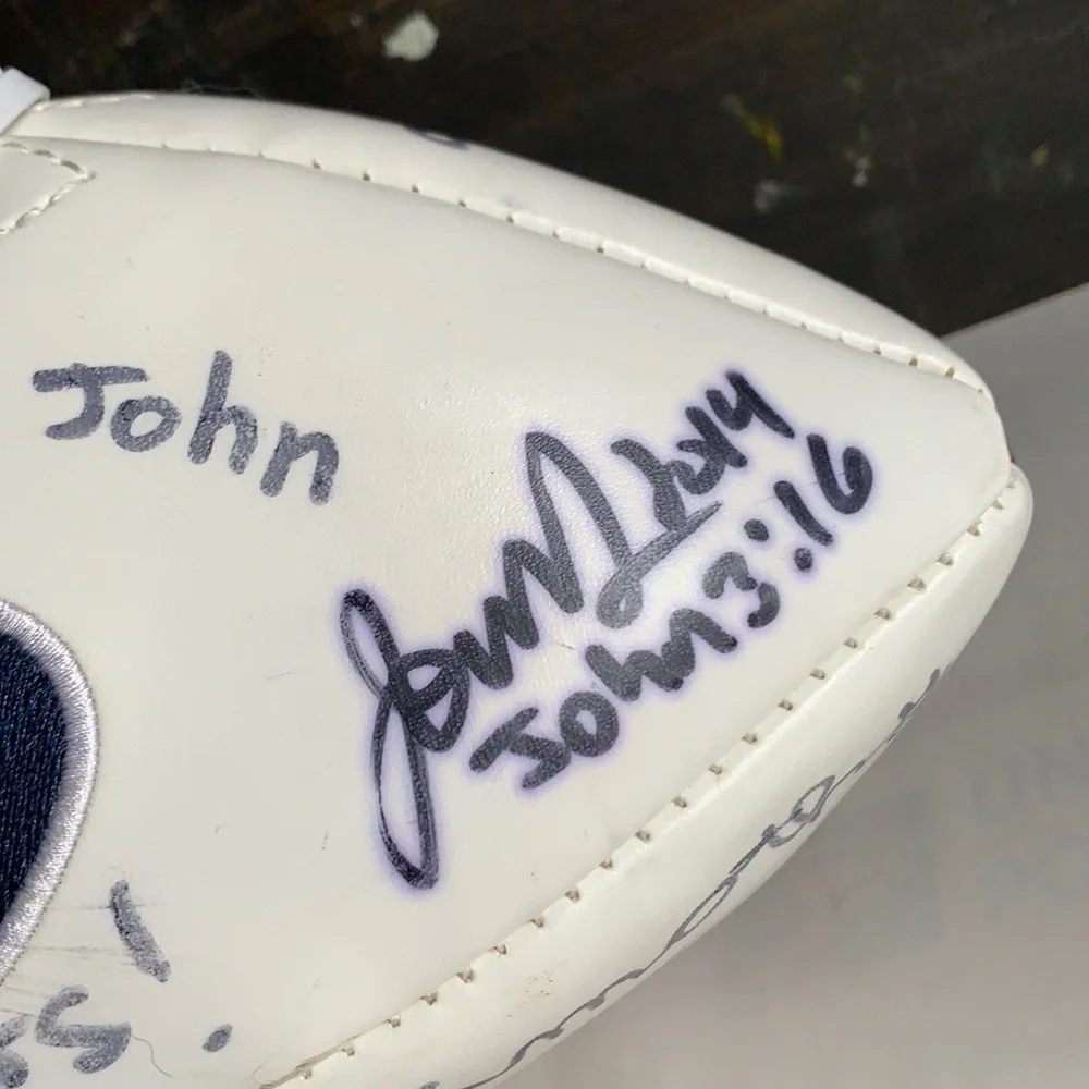 2005 NFC Champions Seahawks football with signatures read below
